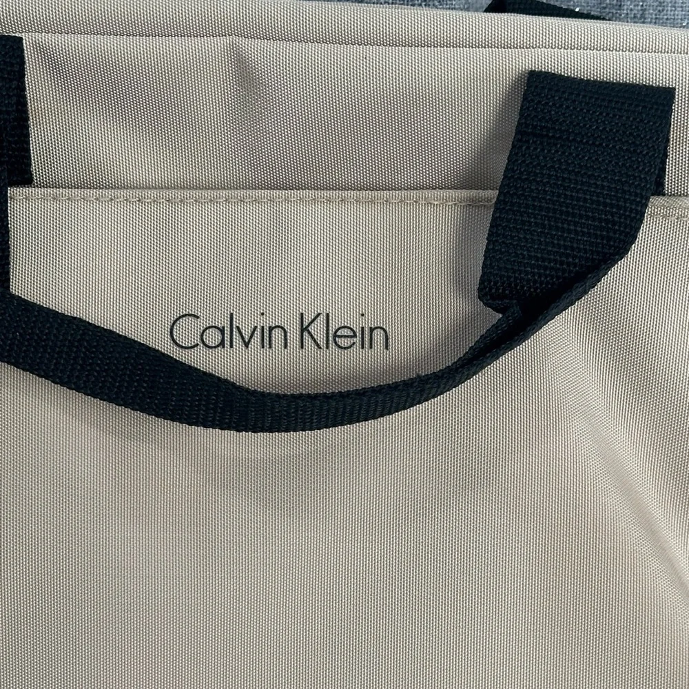 Calvin Klein Tan and Black Laptop Bag with Sturdy Fabric